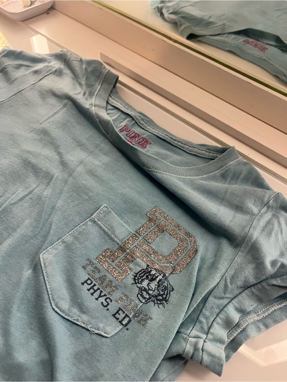 PINK Victoria's Secret Light Blue Girls' Pocket Tee with Glitter Varsity Graphic